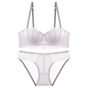 Elegant French lace lingerie set in light lilac with floral patterns and half-cup bra