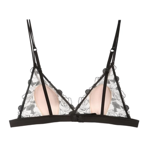 Detail of black lace triangle bra featuring floral embroidery and adjustable thin straps