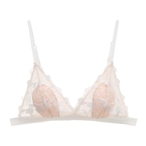 Close-up of white floral lace embroidery on thin triangle cup bra with adjustable straps