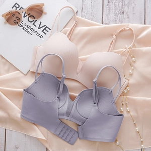 Detail of pink and purple seamless wireless bras with scalloped edges and silk fabric