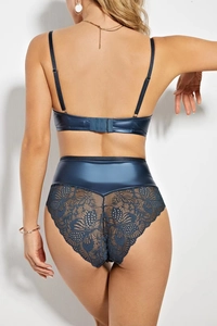 Detailed back view of metallic blue lingerie set featuring intricate floral lace panels