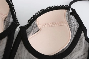 Close-up of French embroidered lace bra with skin-friendly lining and precision stitching