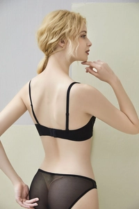 Rear view of black lace bra and mesh panties set with elegant thin straps and back closure
