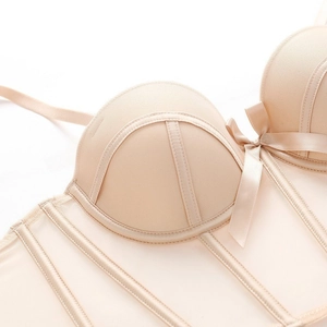 Nude lace bustier bra with bow detail and corset boning in a high-quality satin mesh finish