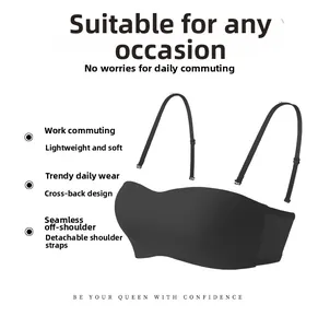 Detail showing seamless black bandeau bra with detachable straps and cross-back design