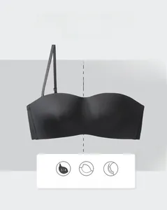 Detail view of seamless black wireless bra with 3/4 cups and smooth stretch fabric