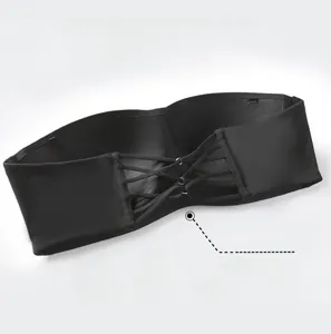 Detail of black strapless bra back showing high-elasticity crisscross straps and seamless fabric