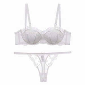 Detailed view of the white lace embroidery bra set with mesh and adjustable straps