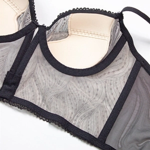 French-style lace bra featuring sheer grey mesh and thin straps with inner padding