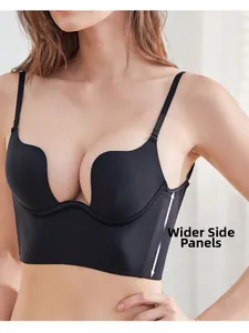 Macro view of black deep U-plunge seamless bra with wide side wings for breast lifting