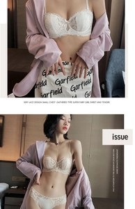 Vista dettagliata del set reggiseno in pizzo bianco con ricami floreali e fodera in seta