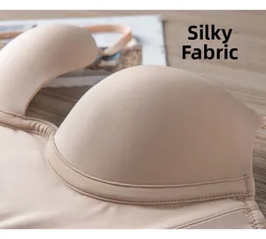 Detailed macro view showing the silky smooth texture and seamless fabric of the nude bra