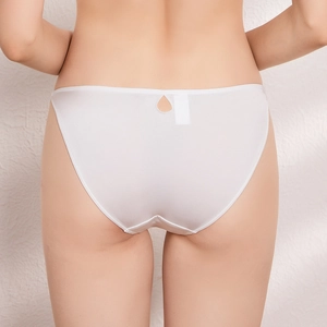 Detail view of white seamless low-rise briefs featuring a sexy teardrop cutout at the back