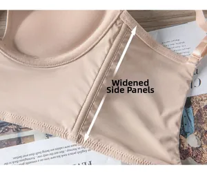 Detail view of the wide side ratio design on a beige backless bra with smooth fabric