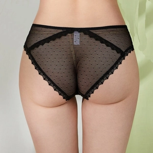 Culotte sexy en dentelle à pois noirs avec coupe haute et tissu en maille aérée