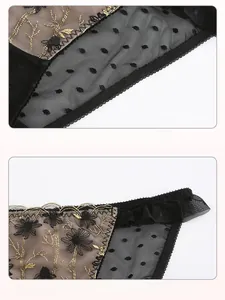 Detail of sheer black mesh with gold embroidery and elastic wavy waistband