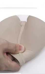 Macro detail of high elasticity beige bra pad showing soft foldable texture and resilience