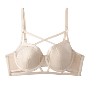 Beige French-style lace bra with cross-strap details and soft underwire support
