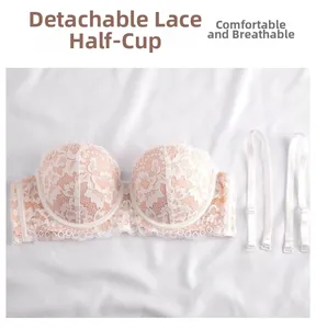 Detailed macro view of the detachable shoulder straps and lace half-cup bra texture