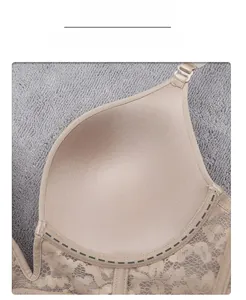Detailed close-up of deep V-cut push-up bra featuring delicate lace trim on the side wings