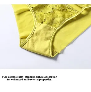 Détail de culotte en dentelle jaune avec un gousset en pur coton doux et respirant