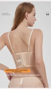 Detail of the multi-row hook closure and breathable mesh on the beige back support bra