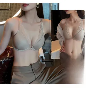 Front-closure apricot lace bra with seamless cups and elegant cross-back straps