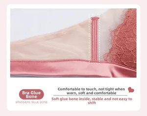 Detail of pink satin bra side wing featuring soft inner glue bone and mesh lace trim
