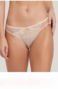 Close-up of nude lace panties featuring sheer mesh panels and a small bow detail