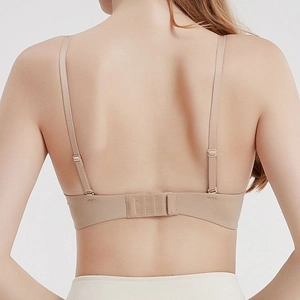 Seamless nude bra with adjustable straps and multi-row back closure for a sleek look