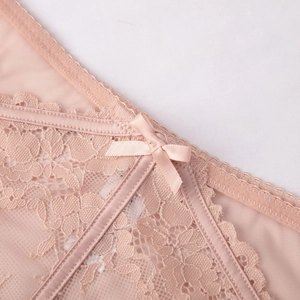 Lace embroidery briefs with hollow floral pattern and satin bow in pastel pink color