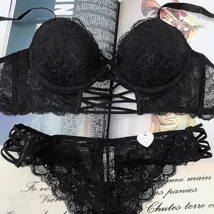 Lace lingerie set with black push-up bra and matching panties featuring floral patterns