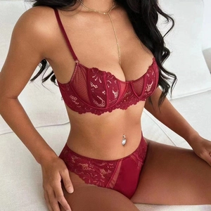 Lace lingerie set in deep red featuring underwire bra and matching briefs with embroidery