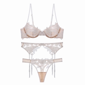 Three-piece beige lace lingerie set with sheer mesh floral embroidery and garter belt