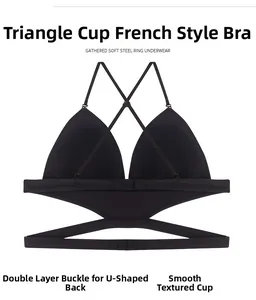 Detail of French triangle cup bra with U-back design and thin straps on white background