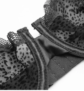 Close-up of sexy sheer leopard print mesh bra with premium satin trim and stitching