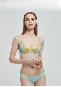 Detailed shot of sky blue lace bra and yellow satin trim set with soft underwire support