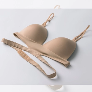 Detail view of seamless beige French bralette with smooth fabric and adjustable straps