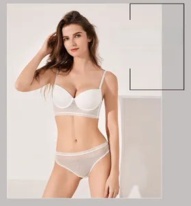 Detail of white mesh lingerie set with stripe pattern and wide elastic band