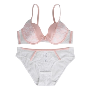 Detail view of white floral lace lingerie set with pink trim and underwire support