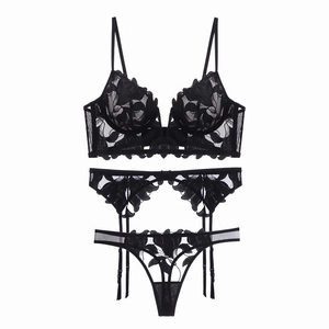 Three-piece black lace lingerie set with floral embroidery and mesh detail