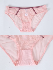 Detail of light pink floral lace and mesh panties with purple satin trim and cotton crotch