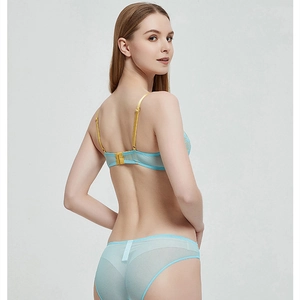 French lace lingerie set in light blue with yellow contrast straps on model back view