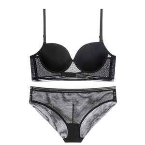 Seamless U-back lingerie set in black with mesh polka dot trim and matching panties