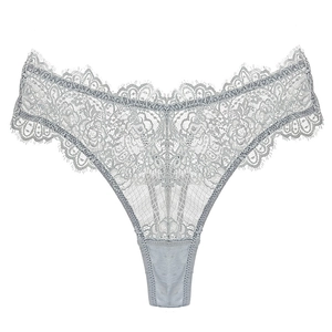 Detail of light blue-grey lace thong showing fine floral mesh and eyelash trim edges