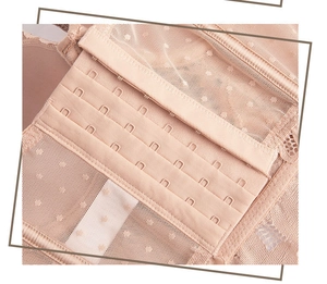 Detail of 7-row 4-hook back closure on lace corset bra with breathable mesh fabric