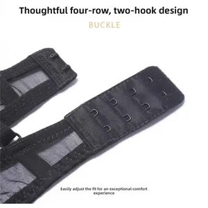 Close-up of black lace bra back closure featuring four rows and two hooks