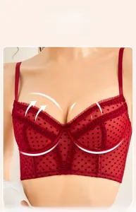 Detail of wine red lace lingerie with black polka dot mesh and soft underwire support