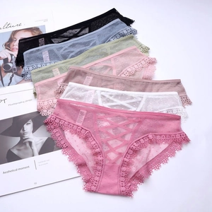 Slip in pizzo in sette colori con pois trasparenti e dettagli con cinturini incrociati