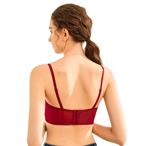 Burgundy lace bra with thin adjustable straps and mesh side wings on white background